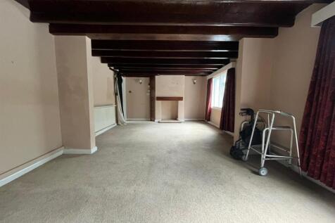 SITTING ROOM AND DINING AREA
