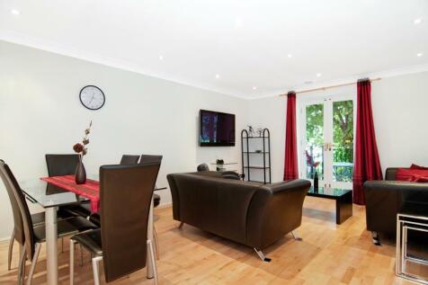 A contemporary and well proportioned two bedroom and two bathroom apartment situated on the 2nd floor of this well maintained portered building with the benefit of two small balconies and a secure par