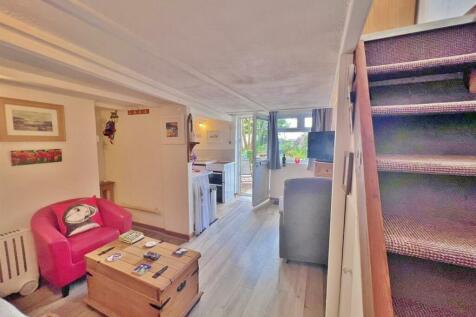 Lounge towards the front door and kitchen