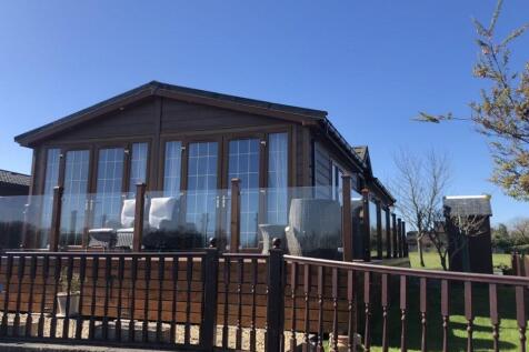 Lancashire Rose Lodge Exterior With Wraparound Dec
