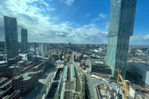 Qube Residential are delighted to welcome this exceptional three-bedroom apartment located within the prestigious Axis Tower, one of Manchester City Centre's most sought-after residential developments