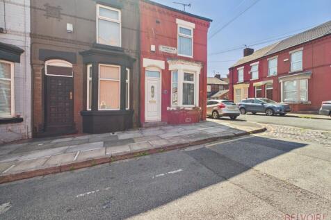 This freshly painted two-bedroom terraced house in Anfield, Liverpool, features a private yard, new carpet, gas central heating, street parking, and close proximity to schools and local shopping. Avai