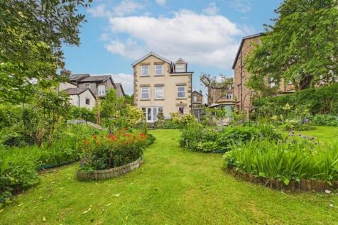 Mature landscaped garden with vegetable and fruit area