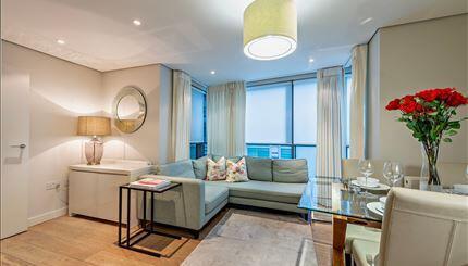 This spacious interior designed three bedroom apartment is set within a modern block in the sought after Paddington Basin in W2. This modern apartment comprises a beautiful reception room with a moder