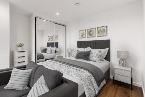 Experience comfort and style in this elegantly designed bedroom.