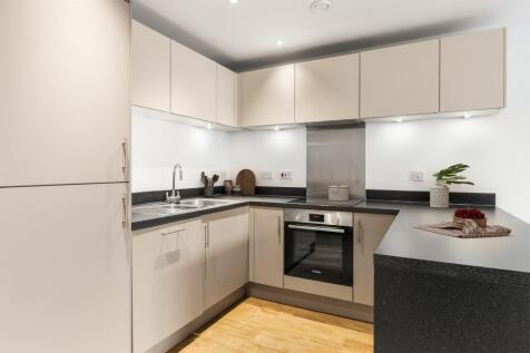 Experience the elegance of a modern kitchen, designed for both style and functionality.