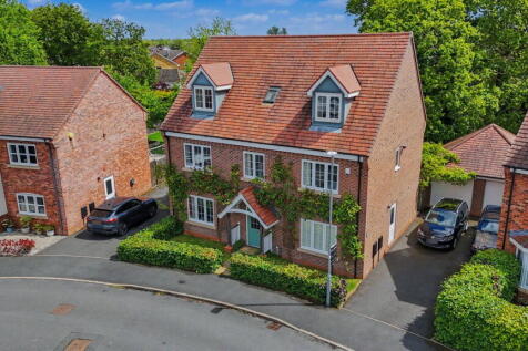 An exceptional six-bedroom, three-storey detached family home built in 2017, offering generous and versatile accommodation extending to approximately 2,395 sq.ft. Situated in the sought-after village