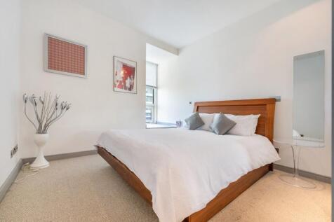 Situated within The Panoramic Building, this well-presented one-bedroom apartment offers bright and comfortable living space with modern finishes throughout. Large windows provide excellent natural li