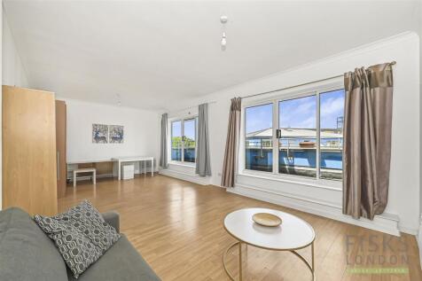 A two-bedroom, one-bathroom apartment situated on the top floor of Flynn Court, Premier Place. The apartment extends to approximately 73 m² (786 sq ft) and comprises a separate kitchen, two double bed