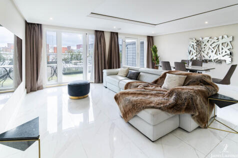 **AVAILABLE NOW** The Royal Arch development located in prestigious Mailbox. This exclusive THREE double bedroom, three En-suite Duplex apartment is offered furnished with private roof terrace, city v