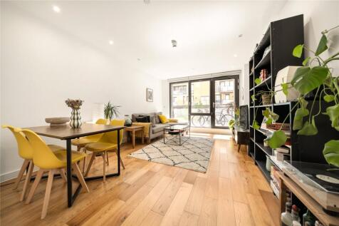 A stylish two-bedroom, two-bathroom apartment in Regalia Point, offering a private balcony, integrated kitchen and floor-to-ceiling windows, moments from Victoria Park, Mile End and Bethnal Green stat