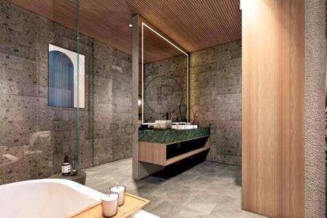 Modern bathroom with stone walls, wooden accents,