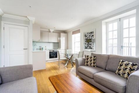 A recently renovated two bedroom apartment on the second floor of this converted period property, offering modern fixtures and fittings throughout and private outside space.