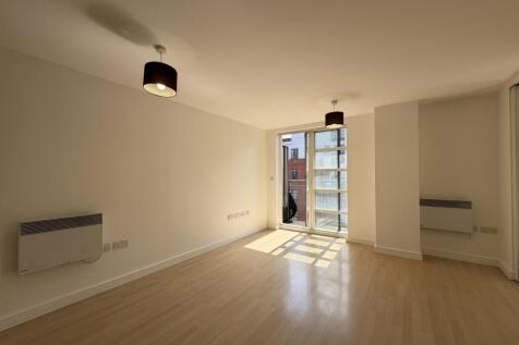 A centrally located two double bedroom apartment at the popular Quadrangle development moments from Oxford Road, First Street, both Oxford Road and Piccadilly Train Stations, St Peters Square or Deans