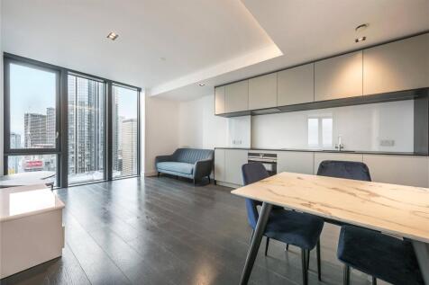 46th-floor apartment in Amory Tower, Canary Wharf with stunning London views. Open-plan living, modern kitchen, spacious bedroom, and sleek bathroom. Concierge, gym, and excellent transport nearby.