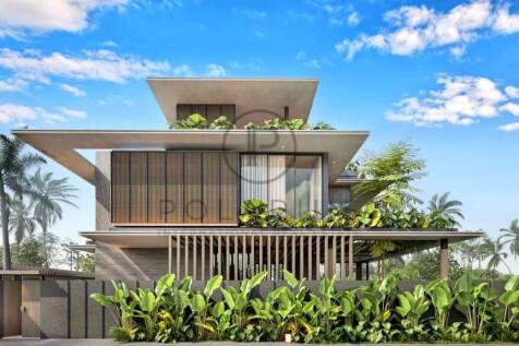 A modern, multi-story house with an open design, f