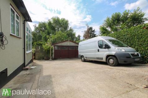 Detached Double Garage and Parking
