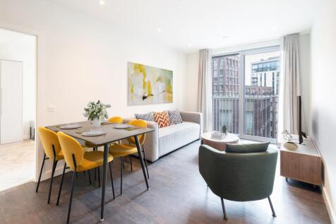 Experience the comfort of this chic urban living space, perfect for relaxation and entertaining.