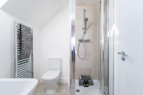 The second floor has its own shower room