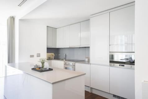 Explore this sleek modern kitchen, featuring stylish design and functionality.