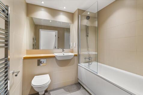 Experience luxury in this elegantly designed bathroom with contemporary fixtures.