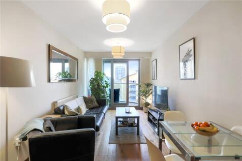 A well-presented fourth floor apartment with underground parking and a balcony with a river view. Benefiting from a concierge, lift and within easy reach of transport at Clapham Junction.