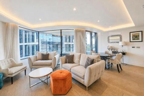 A modern and bright south-facing 928 sq ft (86.21 sqm) two bedroom apartment with balcony, available to rent exclusively through Prime London in The Corniche, 24 Albert Embankment. Located in an envia