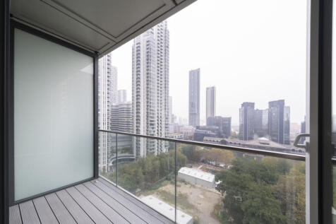 Experience stunning urban views from the comfort of your balcony.