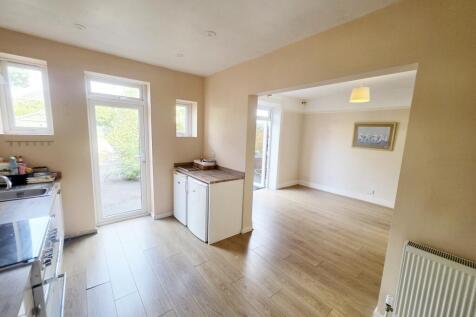 Kitchen Through Dining Rm