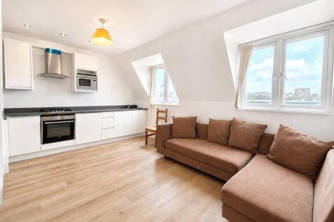 Bright one-bedroom flat on the fourth floor of a well-located building on Kilburn High Road. Featuring a modern open-plan kitchen/reception room, contemporary bathroom and excellent natural light thro