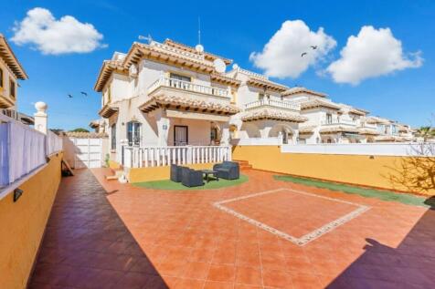 lomas de cabo roig quad villa with communal pool