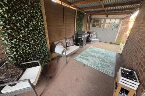 Carport leading to Garage