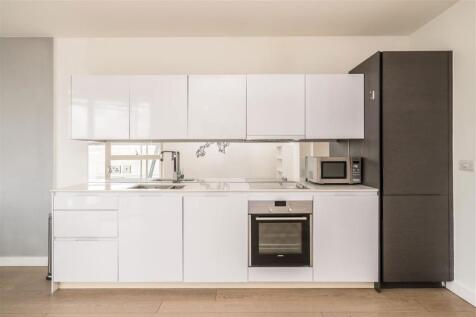 A one double bedroom modern apartment including an open plan living space, floor to ceiling windows and ample storage throughout.