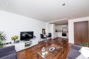 A modern and bright one-bedroom apartment with a balcony and lift access in trendy and vibrant Hackney, close to Hoxton station. The property features a modern kitchen with integrated appliances, an a