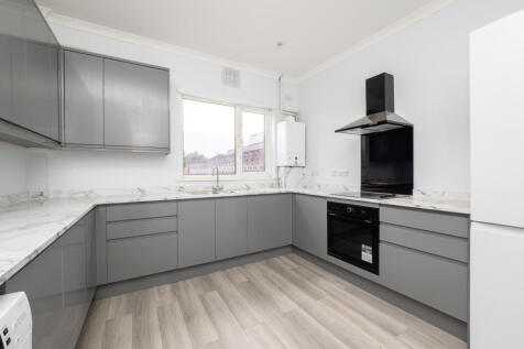 MODERN THREE DOUBLE BEDROOM APARTMENT SPLIT OVER TWO FLOORS LOCATED ABOVE COMMERCIAL PREMISES; To the first floor a good-sized lounge, kitchen with built in storage cupboard and second reception room/