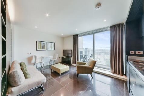 Modern, well-planned studio apartment with a balcony in Pan Peninsula E14, the sought-after Canary Wharf development minutes from South Quay DLR station. There is a stylish living/ kitchen area with f