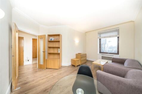 Modern furnished upper-floor apartment offering bright, spacious accommodation with two bedrooms, two bathrooms and a generous reception room. Set in a peaceful development with communal gardens, secu