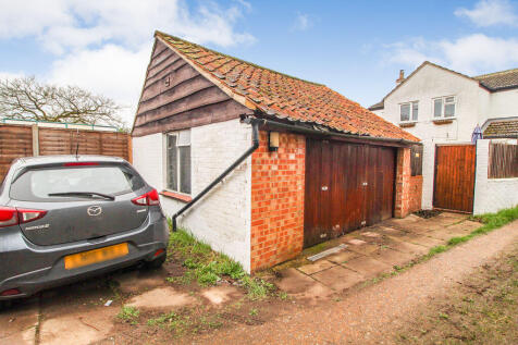 Outbuilding And Parking