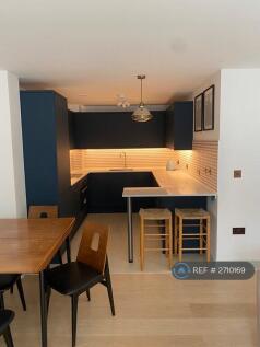 Kitchen With Bar, Washing Machine, Dishwasher