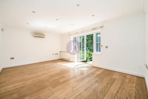 **Sole Agents** Bright and spacious three double bedroom, two-bathroom newly redecorated ground floor apartment (Approx. 1055 Sq Ft, 98 Sq M), set within a small gated purpose built of six apartments,