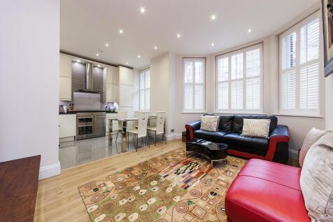 A stunning, modern four-bedroom, four-bathroom apartment on the ground floor of Palace Mansions near Kensington High Street. Fully refurbished with LED lighting, ample storage and porter service. Clos