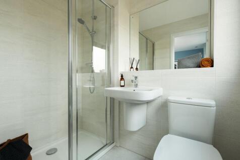 The main bedroom has its own en-suite shower room