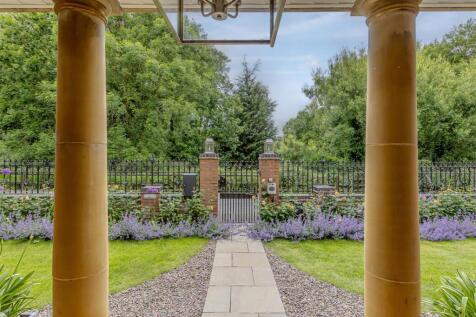 Imposing Gated Entrance and Grand Georgian-Style F