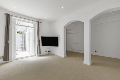 Situated on one of Holland Park's sought-after residential streets, this beautifully presented one-bedroom apartment occupies the basement of an elegant period conversion, offering 872 sq ft of well-p