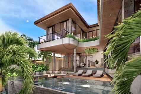 Modern luxury villa with floor-to-ceiling windows,