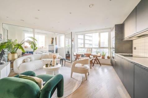 Situated within a highly sought after development in Poplar, this beautifully presented one bedroom apartment offers bright and living throughout. The property features a spacious open plan kitchen an