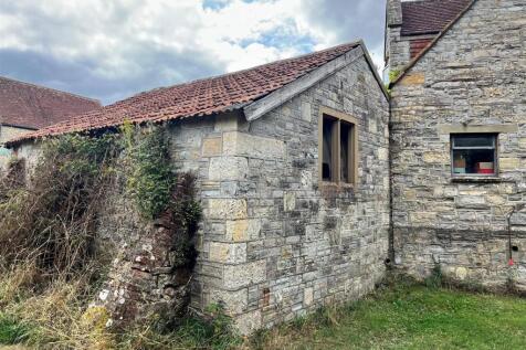 outbuilding attached to house.jpg