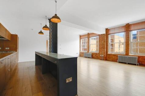 Spacious two-bed, two-bath warehouse conversion in The Jam Factory SE1. Features original brickwork, high ceilings, concierge, and top location near Borough Market and London Bridge.