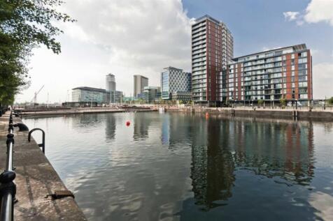 A furnished one double bedroom apartment with Juliet balcony located on the first floor of the City Lofts Development in Salford Quays. Designed by Conran & Partners, the development provides modern d