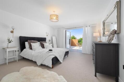 Bedroom with balcony access